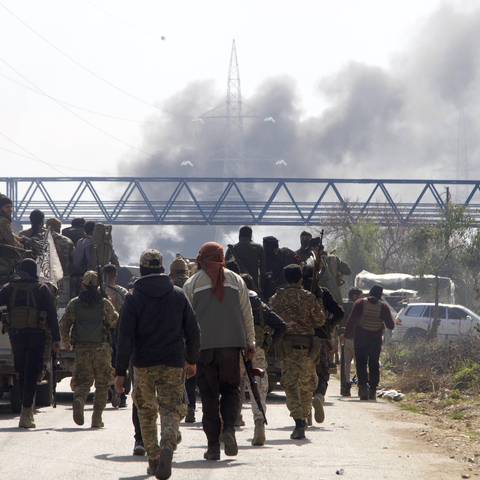 rian security forces are seen on the Tartous-Latakia highway in Latakia province, northwestern Syria, on March 7, 2025