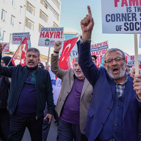 October 30, 2022, Ankara, Turkey: Protesters chant slogans while marching through the Streets holding placards and flags during the demonstration. An anti-LGBTI march and press release took place in Ankara, Turkey which is planned by Ankara Civil Society Platform