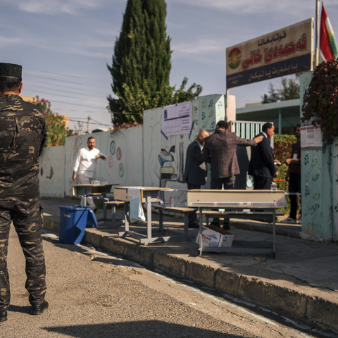 Voters Cast Ballots in Zakho Voters arrive at a polling station during the parliamentary elections in Zakho, Dohuk Governorate, Kurdistan Region, Iraq, on November 11, 2025. Security forces were deployed near polling stations to maintain order during the vote. (IMAGO / Middle East Images)