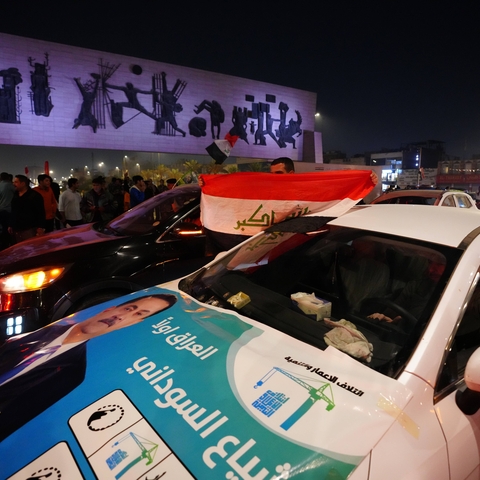 Supporters of the Reconstruction and Development Coalition drive through the streets and celebrate in Baghdad, Iraq, after the Reconstruction and Development Coalition headed by Prime Minister Mohammed Shia al-Sudani wins the most votes in general elections, according to unofficial results, on November 12, 2025.