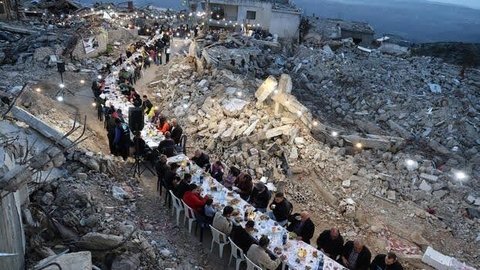 Breaking the fast: around 400 people dine among the remains of their homes, which were destroyed in Israeli airstrikes during Ramadan. (Kfar Shouba, Lebanon, 17.3.2025)