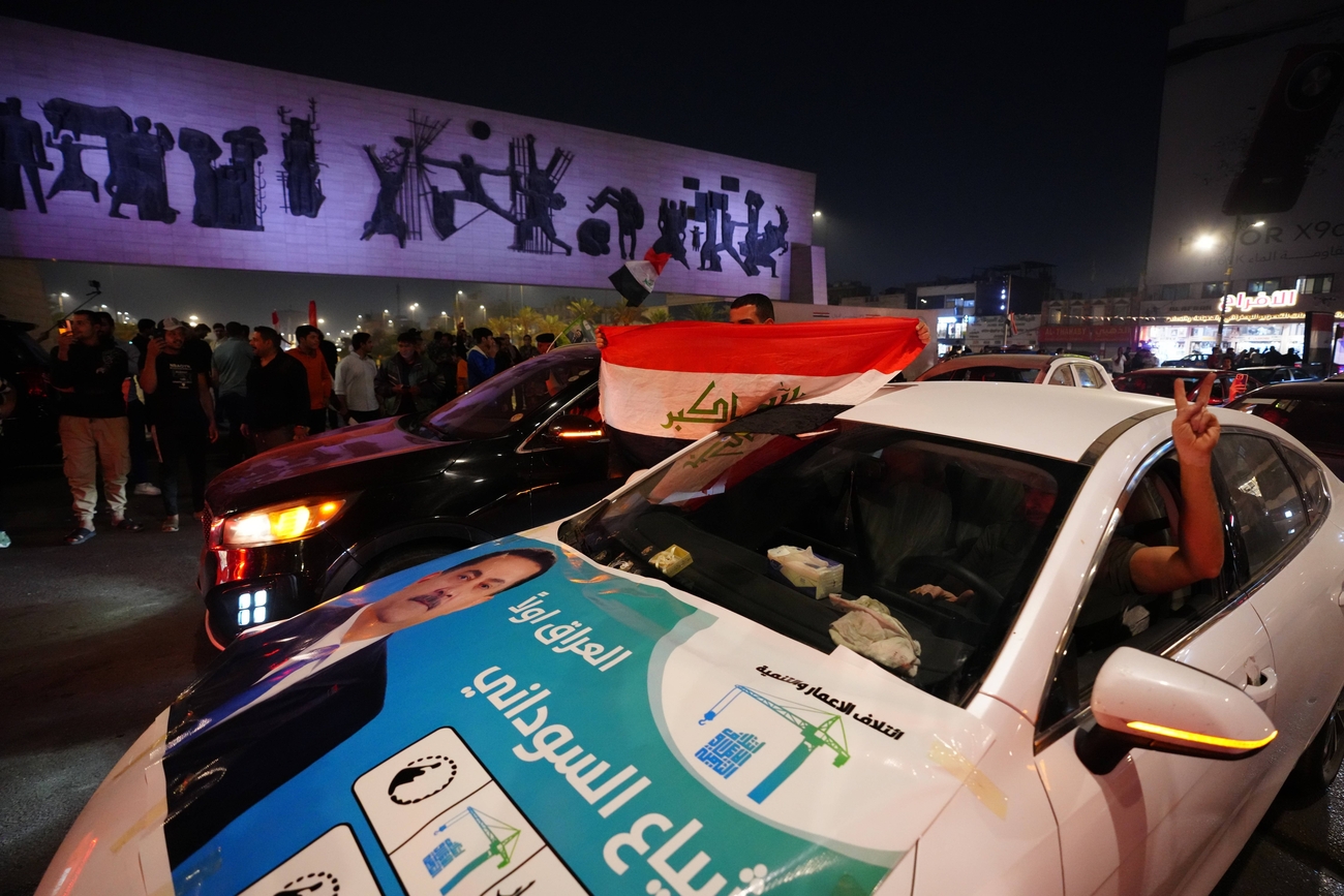 Supporters of the Reconstruction and Development Coalition drive through the streets and celebrate in Baghdad, Iraq, after the Reconstruction and Development Coalition headed by Prime Minister Mohammed Shia al-Sudani wins the most votes in general elections, according to unofficial results, on November 12, 2025.
