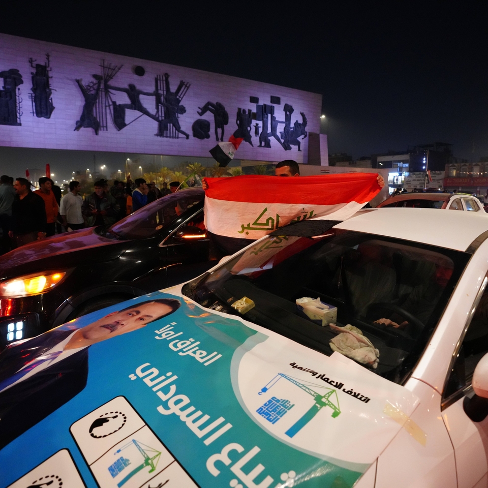 Supporters of the Reconstruction and Development Coalition drive through the streets and celebrate in Baghdad, Iraq, after the Reconstruction and Development Coalition headed by Prime Minister Mohammed Shia al-Sudani wins the most votes in general elections, according to unofficial results, on November 12, 2025.