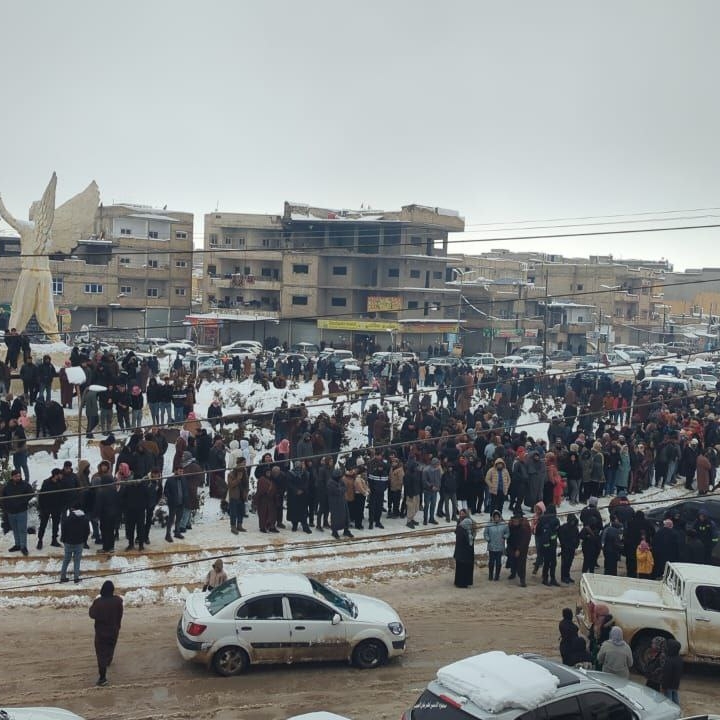 People in Kobani waiting for the UN aid convoy. Photo credit: Khalil Muhammad.