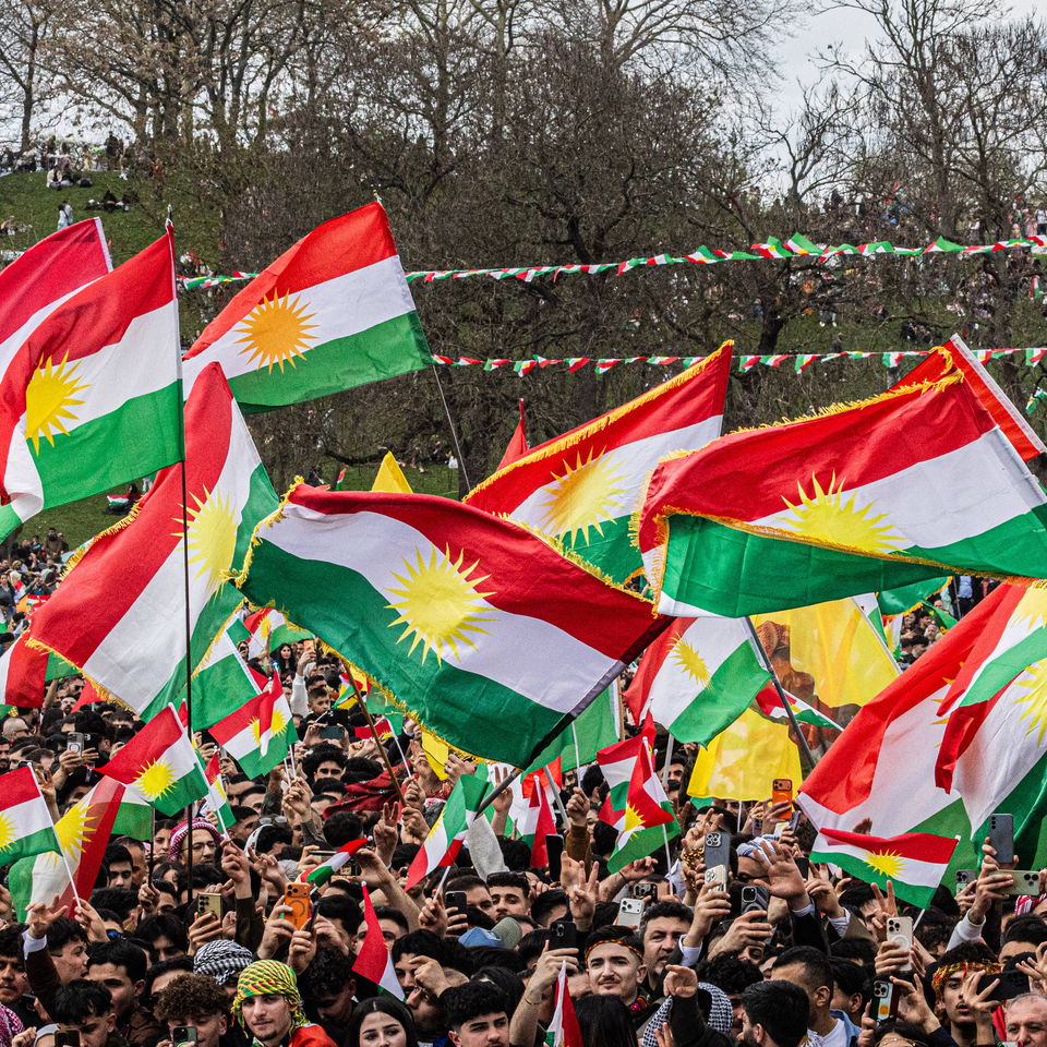 Kurds demonstrate with the flag of Kurdistan (also called Ala Rengin) on Saturday (March 23, 2026) in the Rheinaue park in Bonn for their own state of Kurdistan and celebrate the New Year and spring festival of Newroz. 