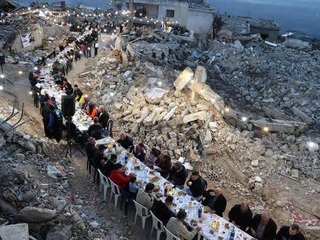 Breaking the fast: around 400 people dine among the remains of their homes, which were destroyed in Israeli airstrikes during Ramadan. (Kfar Shouba, Lebanon, 17.3.2025)