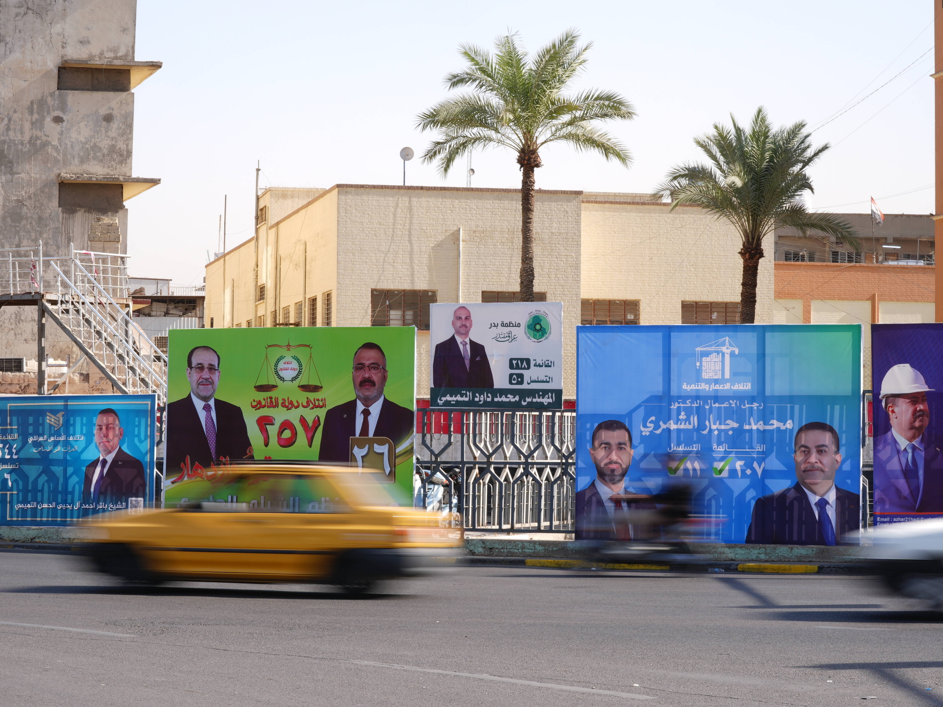 Posters of candidates running in Iraq’s upcoming parliamentary elections, scheduled for November 11, are displayed on the streets of Baghdad, Iraq, on October 06, 2025. IMAGO / Anadolu Agency