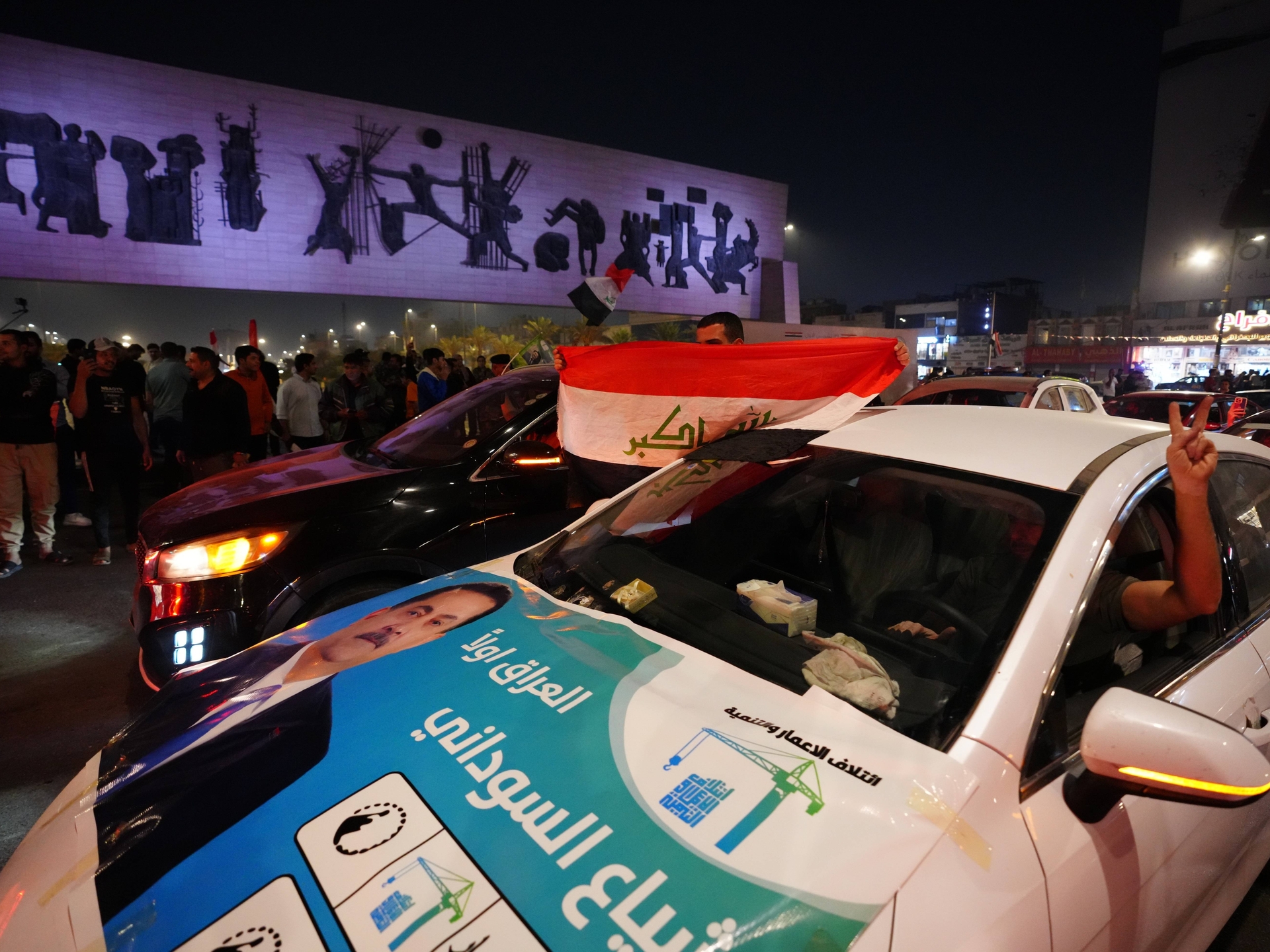 Supporters of the Reconstruction and Development Coalition drive through the streets and celebrate in Baghdad, Iraq, after the Reconstruction and Development Coalition headed by Prime Minister Mohammed Shia al-Sudani wins the most votes in general elections, according to unofficial results, on November 12, 2025.