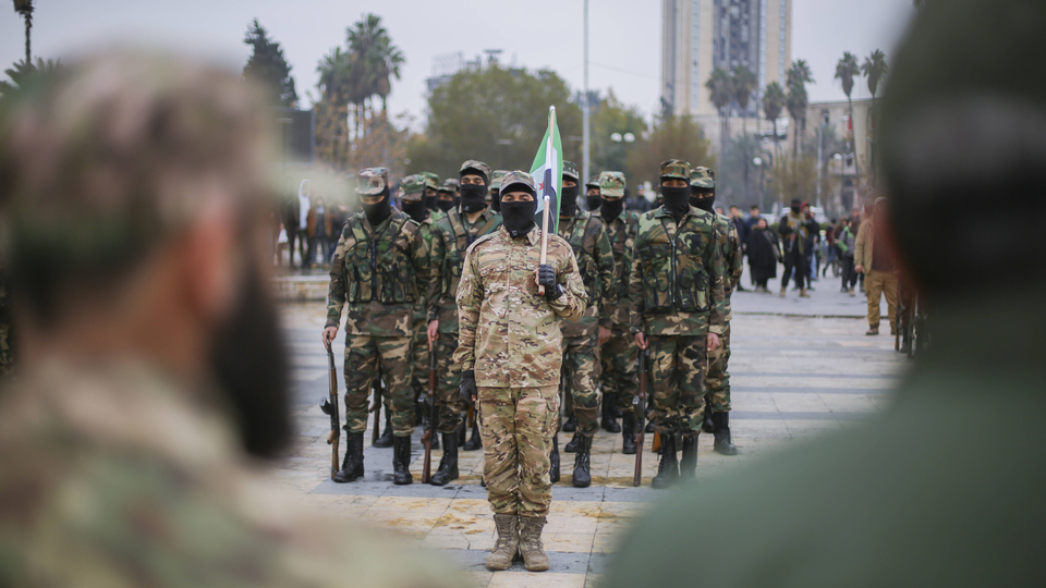 Syria Conflict Security Graduation Graduates of Syria s General Security forces under the country s new administration attend a ceremony in the northern city of Aleppo on February 12, 2025. Syrian interim President Ahmed al-Sharaa said in an interview released on February 10, that thousands of people were joining the country s new army following the overthrow of Bashar al-Assad and the dissolution of his military. Since the fall of longtime ruler Assad in December, Syria s authorities have dissolved the for