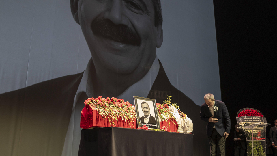 Istanbul Bids Farewell to Onder Tuncer Bakirhan, Co-Chair of the DEM Party, bows his head in front of Sirri Sureyya Onder s coffin during his funeral