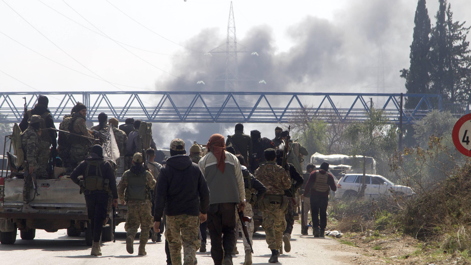 rian security forces are seen on the Tartous-Latakia highway in Latakia province, northwestern Syria, on March 7, 2025